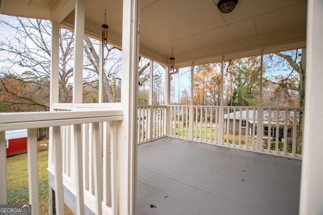 wooden deck with a porch