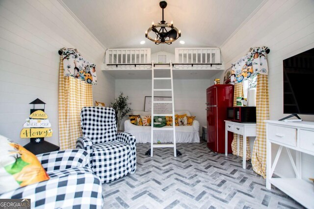 bedroom featuring ornamental molding and an inviting chandelier