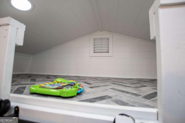 interior space featuring vaulted ceiling