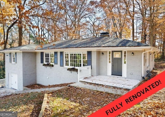 ranch-style house with covered porch