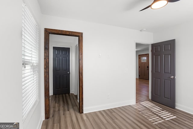 spare room featuring hardwood / wood-style flooring