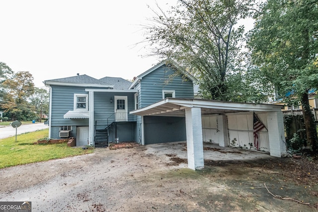 view of front of house with a carport