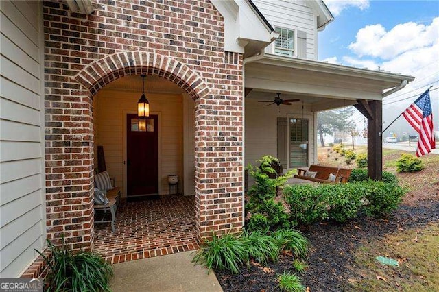 property entrance with ceiling fan