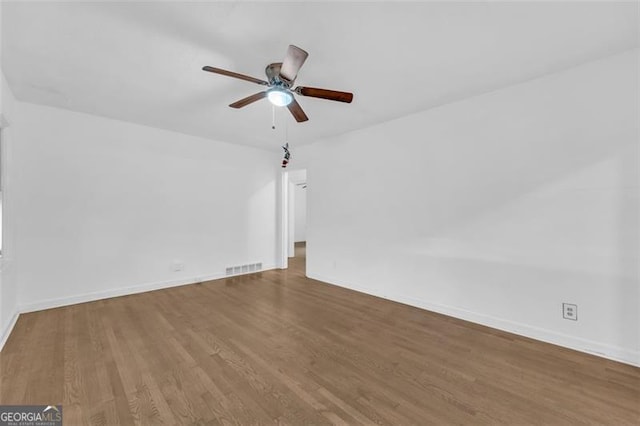 interior space with hardwood / wood-style flooring and ceiling fan