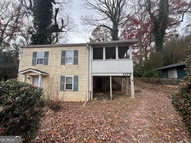 view of front facade featuring a sunroom