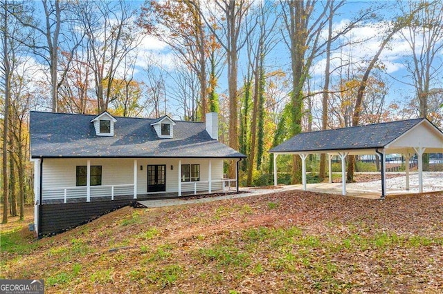 view of front of property featuring covered porch