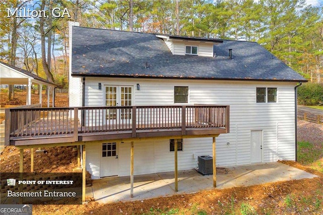 rear view of property featuring central AC, a patio area, and a wooden deck