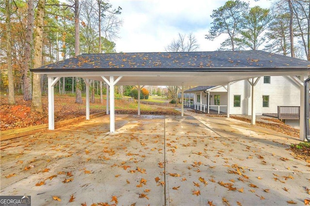 exterior space with a carport