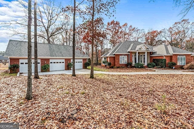 ranch-style home with a garage