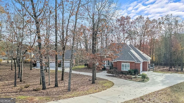 view of side of home with a garage