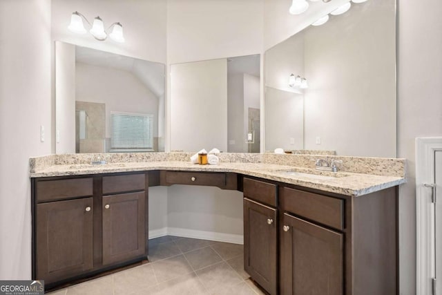 bathroom featuring vanity, tile patterned floors, and an enclosed shower