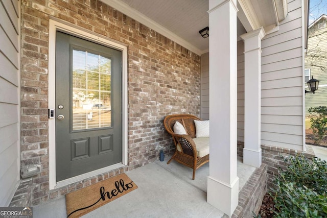 property entrance with covered porch