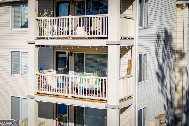 rear view of house with a balcony