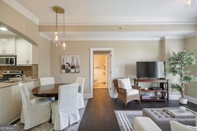 dining space with arched walkways, baseboards, dark wood finished floors, and crown molding