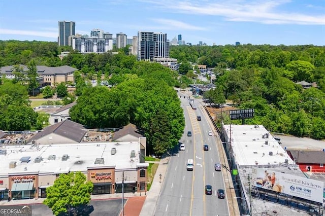 drone / aerial view featuring a city view