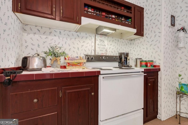 kitchen with white electric range oven