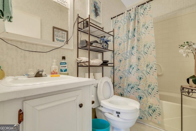 full bathroom featuring vanity, toilet, and shower / bath combo with shower curtain