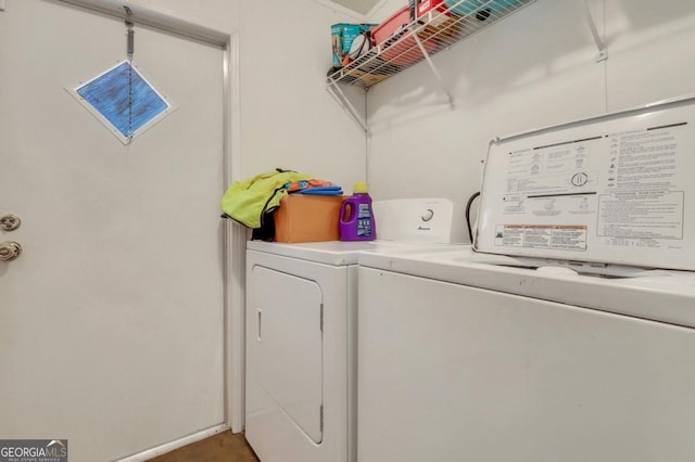 washroom with washer and clothes dryer