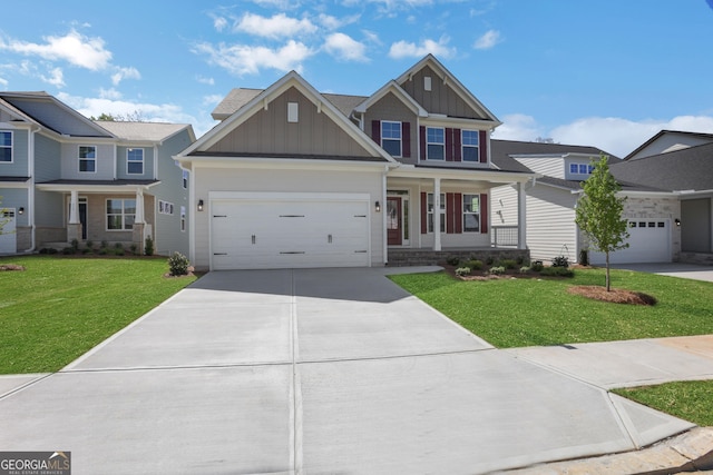 craftsman-style house with covered porch, board and batten siding, driveway, and a front lawn