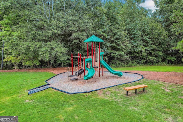 communal playground featuring a yard
