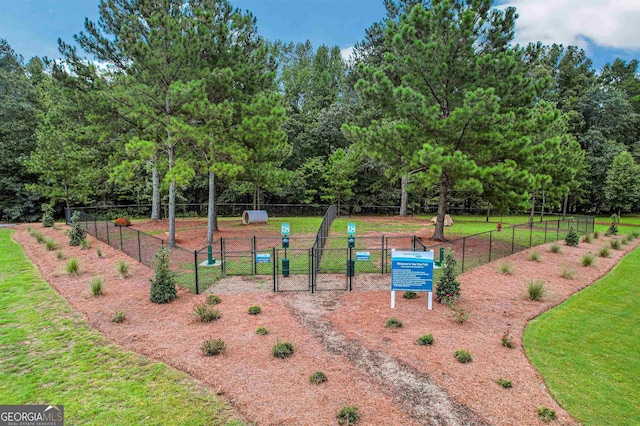surrounding community with fence and a gate