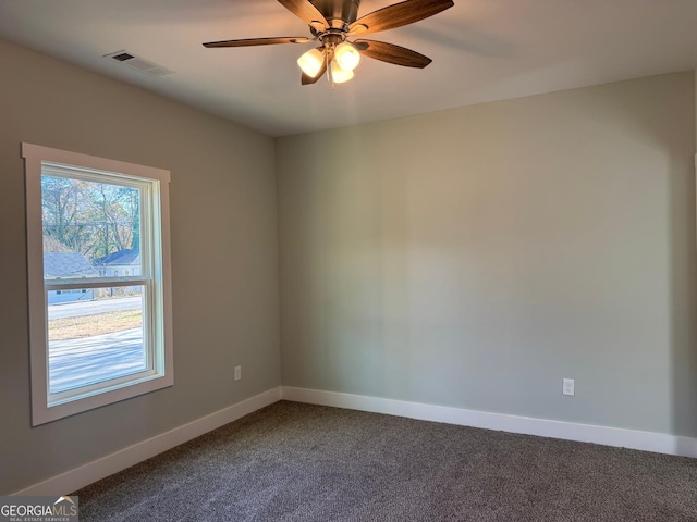 carpeted empty room with ceiling fan