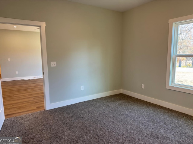 spare room featuring hardwood / wood-style flooring