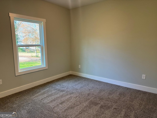 view of carpeted spare room