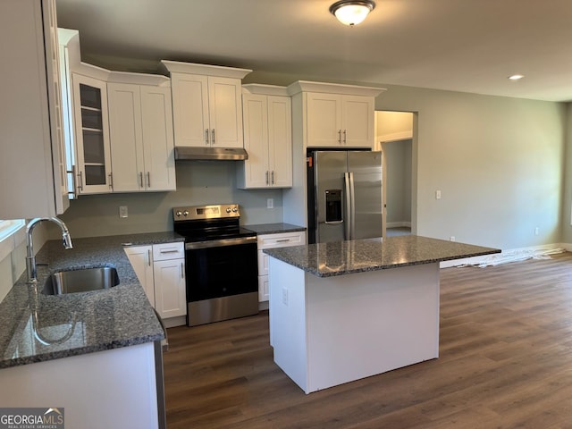 kitchen featuring white cabinetry, sink, dark hardwood / wood-style floors, and appliances with stainless steel finishes