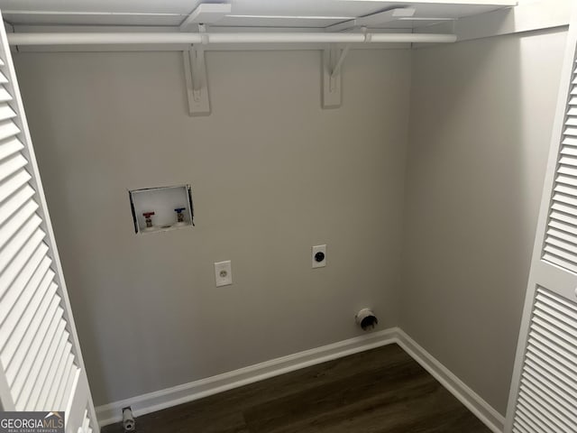 laundry room with hookup for a washing machine, dark hardwood / wood-style floors, and electric dryer hookup