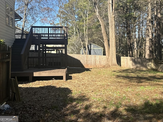 view of yard featuring a deck