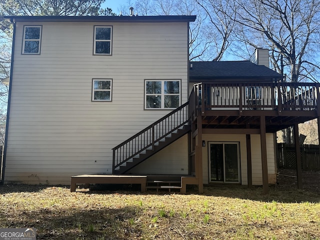 back of property with a deck