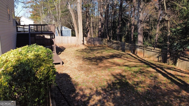 view of yard featuring a deck