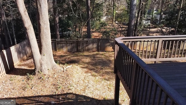 view of yard with a wooden deck