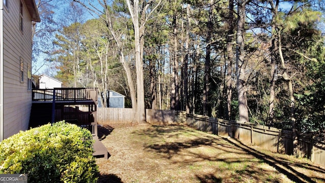 view of yard featuring a deck