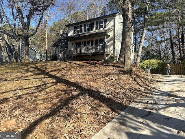 view of front property featuring covered porch