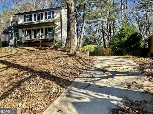 view of property featuring a porch