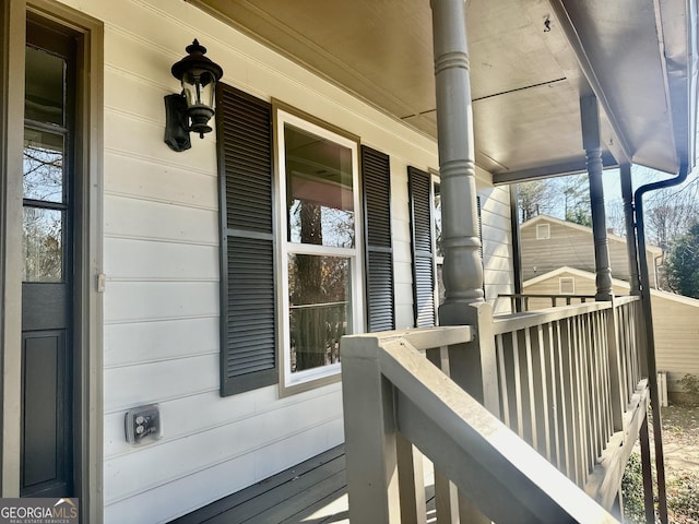 wooden terrace featuring a porch