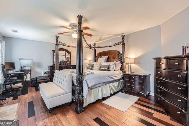 bedroom featuring wood-type flooring and ceiling fan