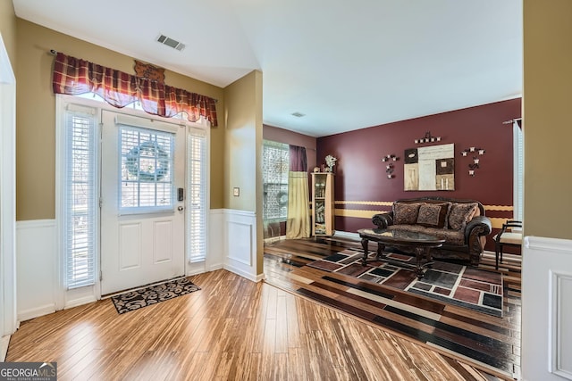 foyer featuring wood-type flooring