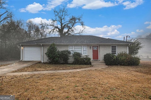 ranch-style house featuring a garage