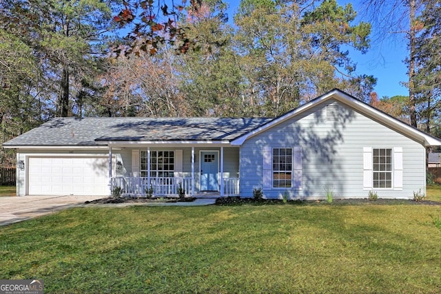 single story home featuring covered porch, a garage, and a front yard