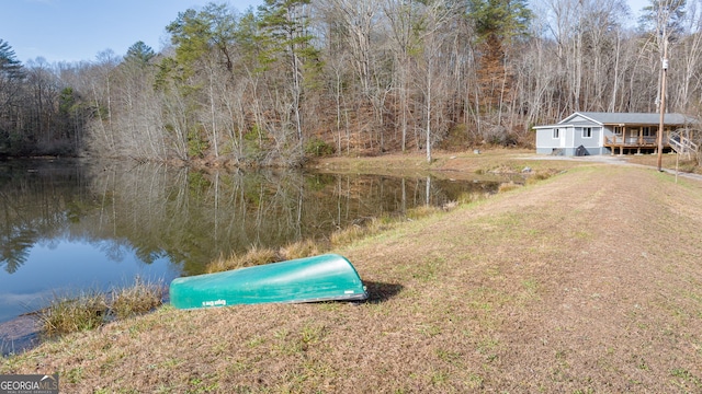 exterior space with a water view