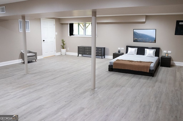 bedroom featuring light wood-type flooring