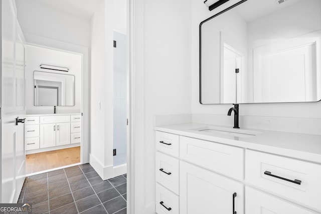 bathroom featuring vanity and tile patterned floors