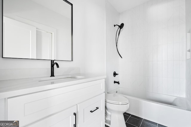 full bathroom with vanity, toilet, tiled shower / bath combo, and tile patterned flooring