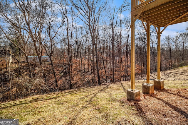 view of yard featuring a wooden deck