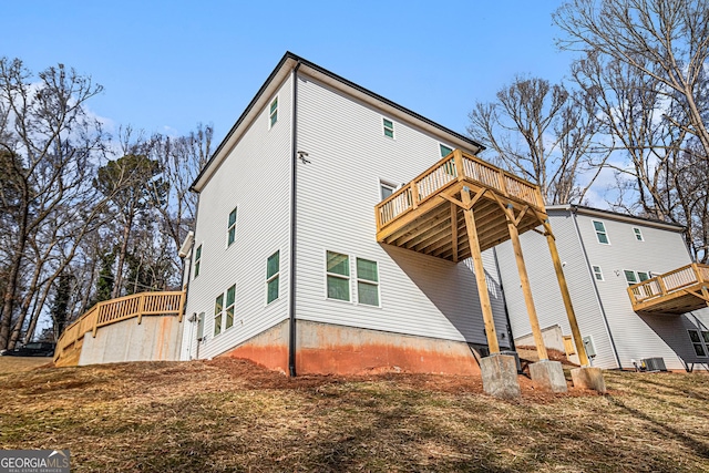 rear view of house with a deck