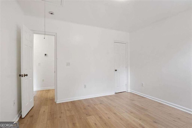 empty room featuring light hardwood / wood-style floors