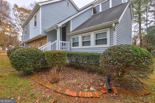 view of home's exterior featuring stone siding